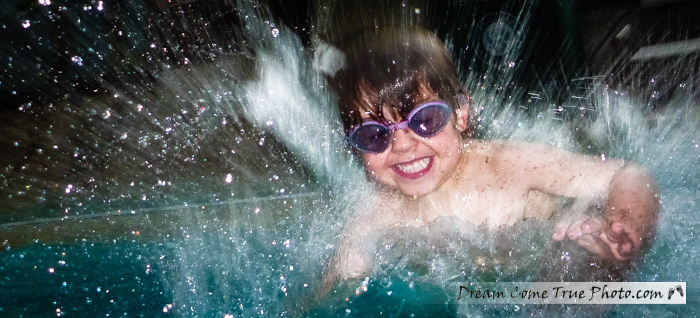 Dream Come True Photo: kid splashing in a pool - testing waterproof point & shoot
