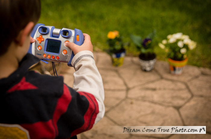 Dream Come True Photo: kid photographing flowers