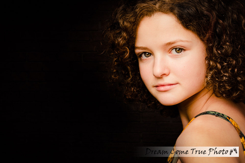 Artistic and glamorous portrait of a gorgeous teenage senior girl during a family photosession in Marlboro NJ