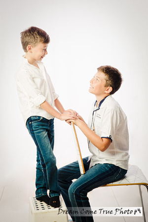 Artistic and creative portrait of two brothers, capturing authentic relationships between the boys in fun timeless portrait 