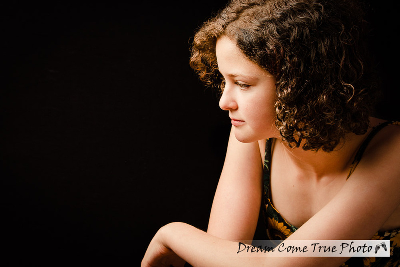 Artistic and glamorous portrait of a gorgeous teenage senior girl during a family photosession in Marlboro NJ